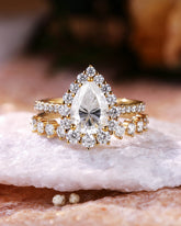 QUINTESSA Halo Pear Shaped Moissanite Engagement Ring Set 2PCS